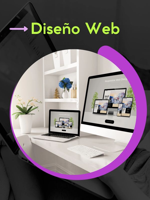 Workspace with computer and laptop showcasing responsive web design.
