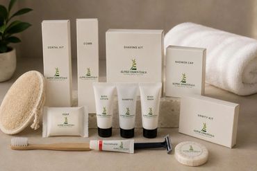A set of neatly arranged Alpine Essentials personal care products and toiletries.