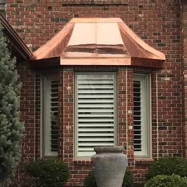 Copper accents bring a style and elegance to your home. As they start to weather, they start to turn