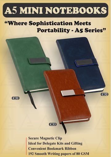 A5 mini notebooks with magnetic clips in green, blue, and brown colors, featuring bookmark ribbons.