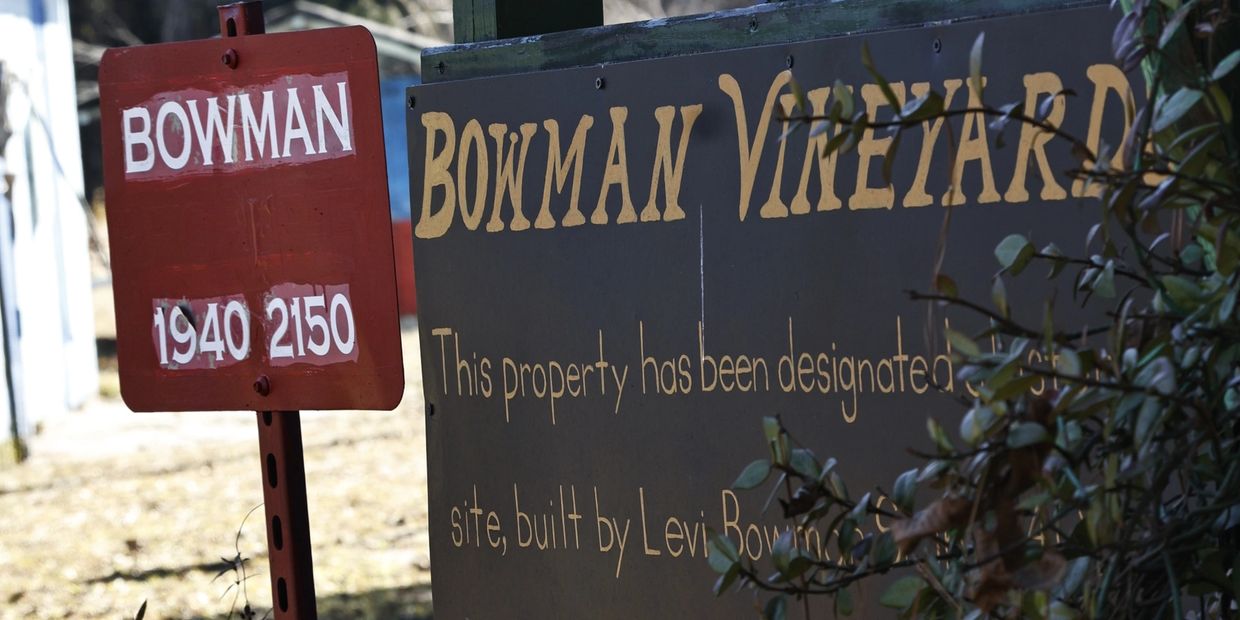 historical family home sign on property