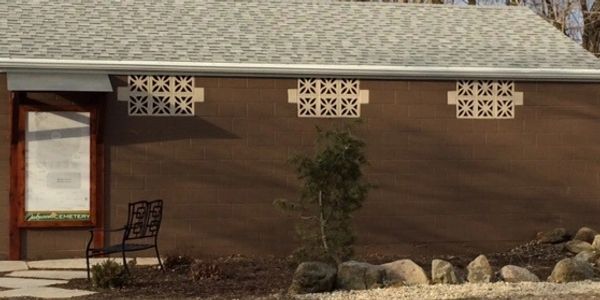 The cemetery shed displaying the map with lot numbers.