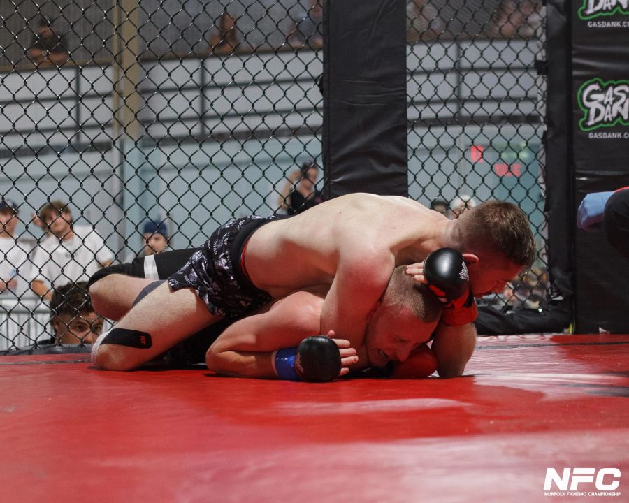 An MMA fight in the cage