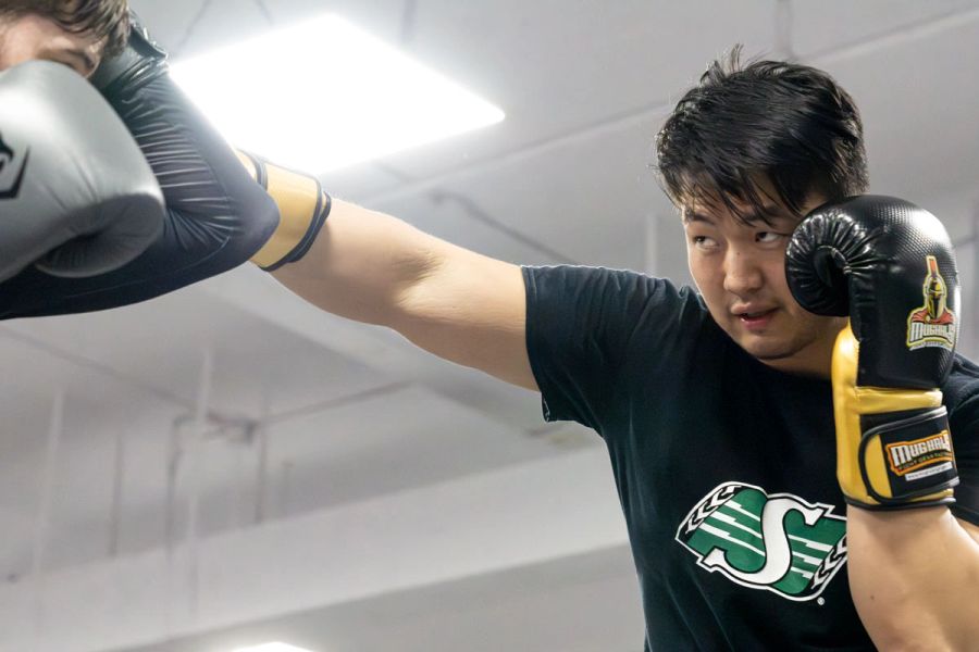 Kickboxing students working on punches