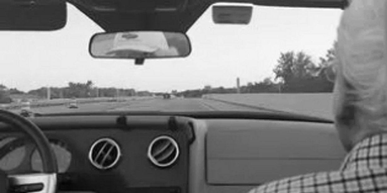 Dale Dyer is seen on the right side of the picture, riding in Don Lindner's Avanti.