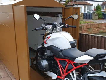 Image of Motorbike being secured in a moving crate 