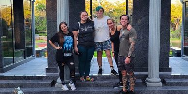 Private cemetery ghost tour with group at Sylvan Abbey Memorial Park in Clearwater, Florida