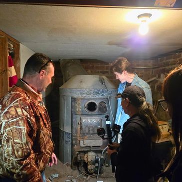Ghost hunting team investigating the basement of a Masonic Lodge in Tarpon Springs, Florida