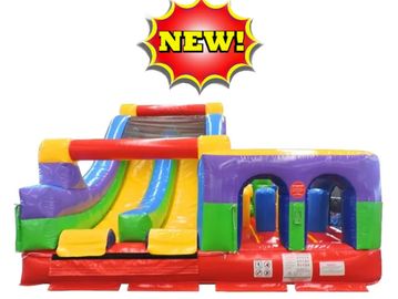 Colorful inflatable bounce house with slides and tunnels, marked as new.
