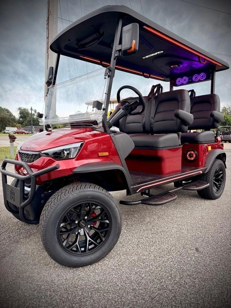 Red DACH golf cart with LED roof lights, for rent in Daytona Beach, Florida