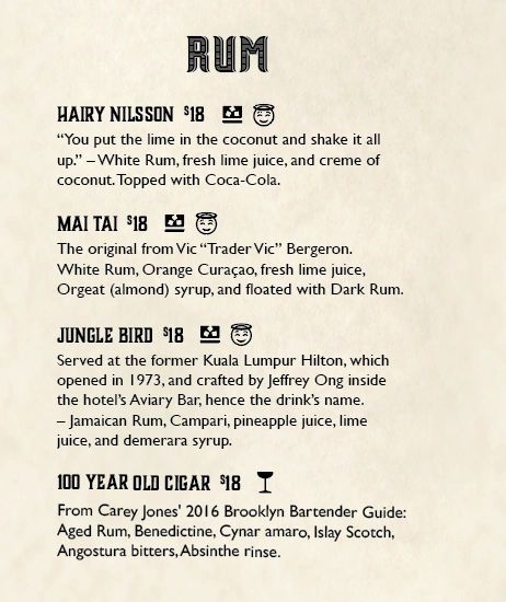 Rum cocktail menu with four drinks and descriptions.