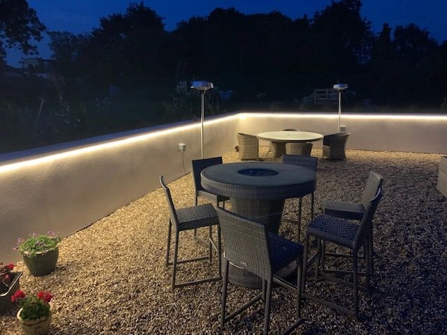LED strip lighting under the edge of the garden wall to illuminate the garden