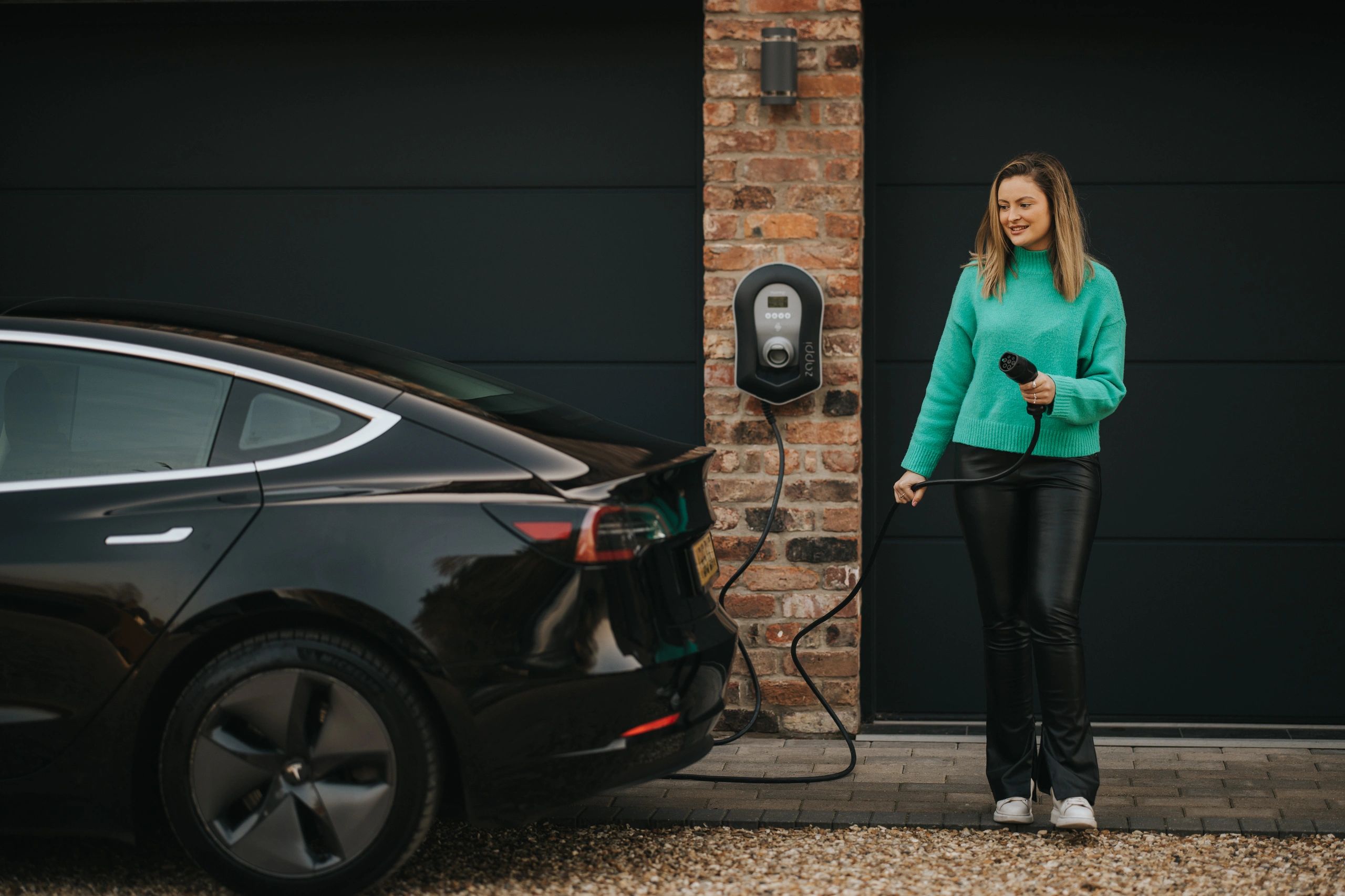 Myenergi's Zappi EV charging point installed on garage wall