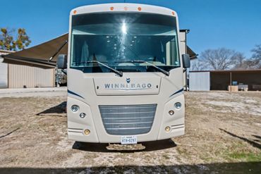 Front exterior photo of a Class A motorhome RV listed for sale