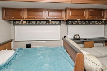 Photo of the bathtub and shower stall inside an RV for sale