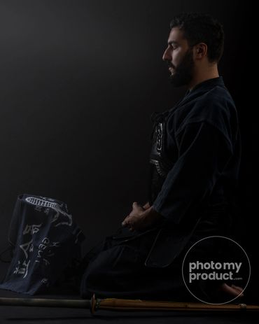 kendo fighter meditating sideways shot