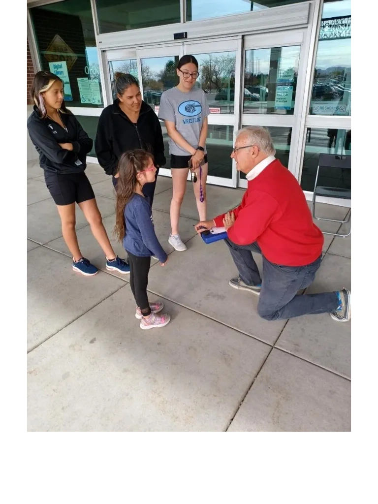 Richard Snelgrove holding a Salt Lake County "Council on the Corner" in West Valley.