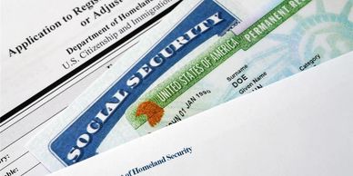 U.S. immigration and social security documents arranged closely.