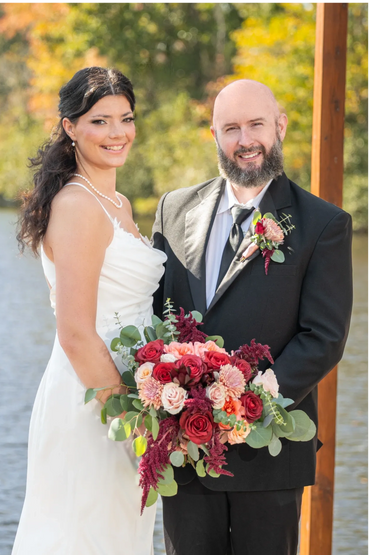 Beautiful fall bouquet with burgundy pink light coral and eucalyptus 
