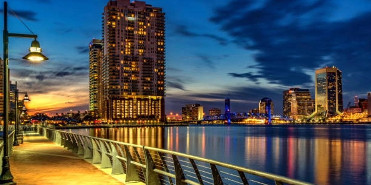 St. Johns River walk while the night sky is covering the sun. It's beautiful 