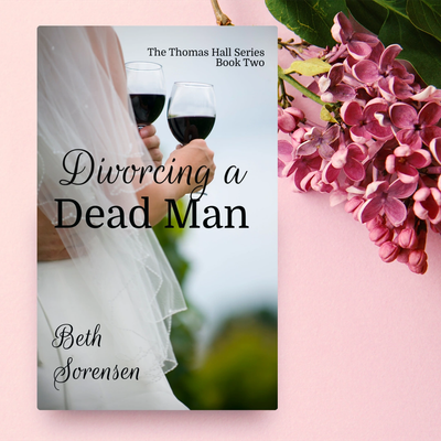 Book cover of 'Divorcing a Dead Man' with a bride holding two wine glasses.