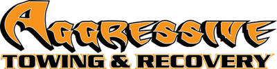 Logo for Aggressive Towing & Recovery in bold orange and black.