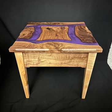 Chose your type of wood and color of epoxy and we can make a table for you. 