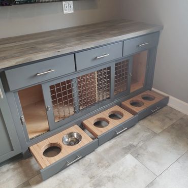 custom dog kennel and feeding area for mudroom