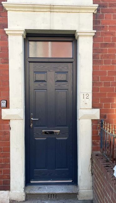 Solid anthracite composite door and top light 