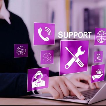 Person using laptop with floating support and service icons.