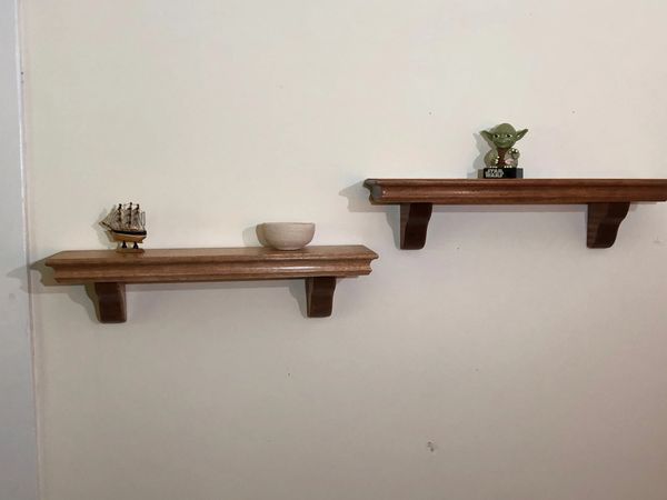 solid wall shelves with corbels made from african mahogany. home decor and storage. custom made