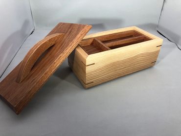 Keepsake box with handled lid and removable tray. 