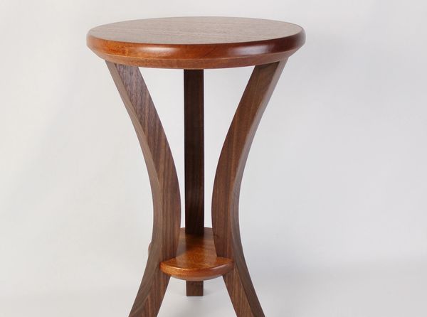 Cocktail table to accompany an Eames chair. Black walnut and mahogany