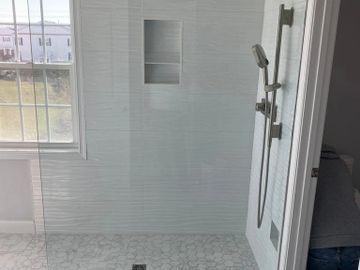 Frameless shower panel 