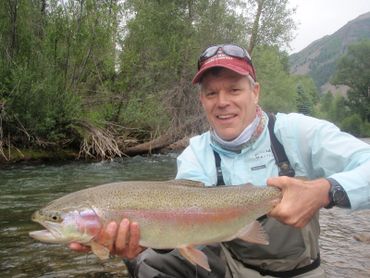 man 8 holding fish