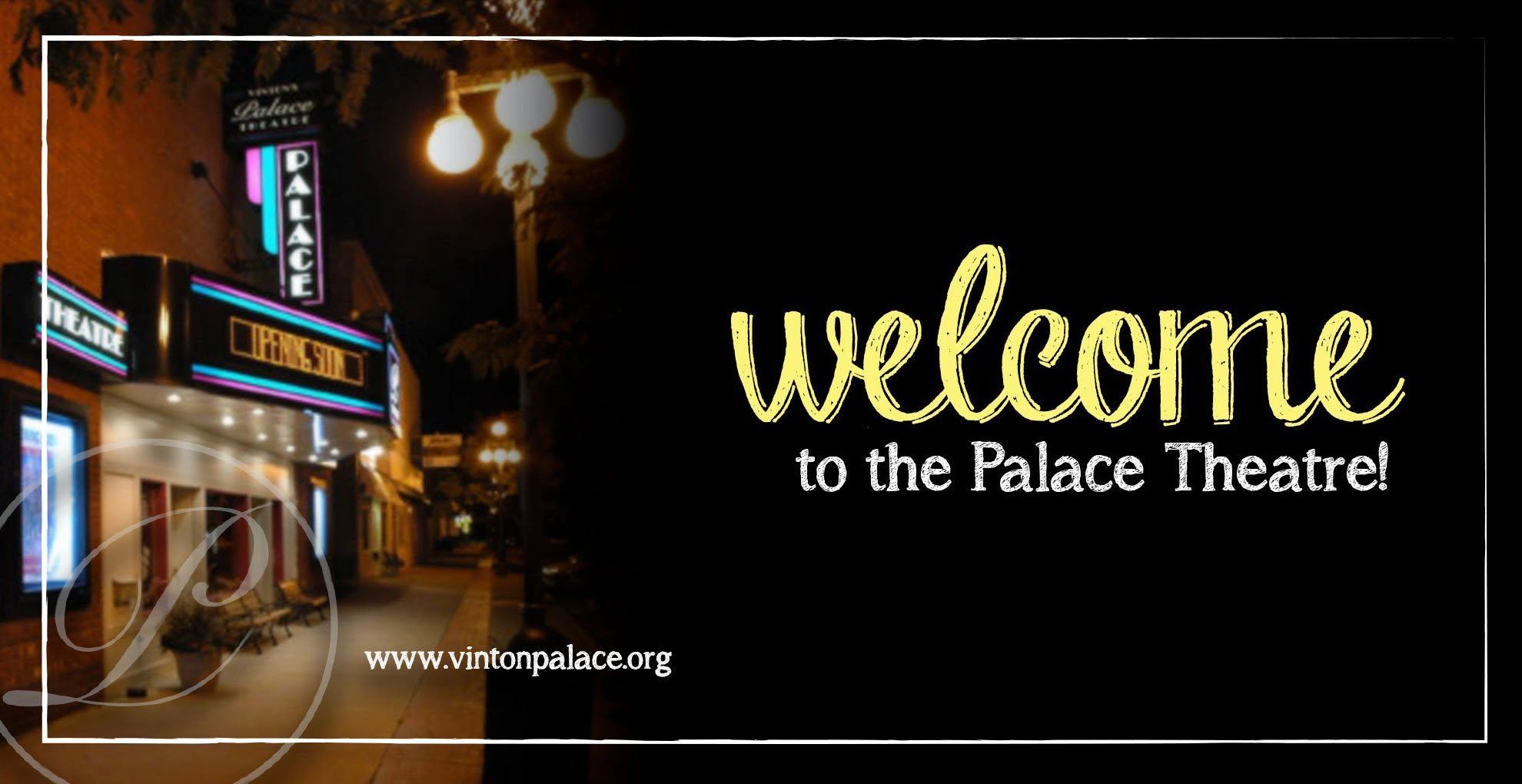 Night view of Palace Theatre with welcome message.