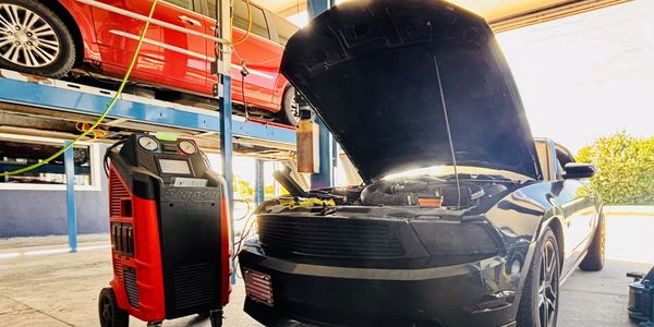 Auto air conditioning pressure test using manifold gauges in Satellite Beach FL