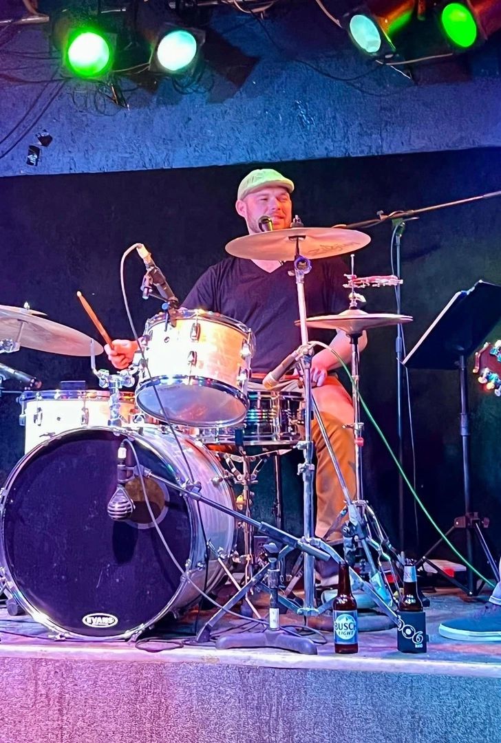 Josh performing live on stage