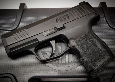 Sig Sauer P365 semi-automatic handgun. 