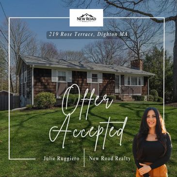 A charming house with an accepted offer sign and a real estate agent.