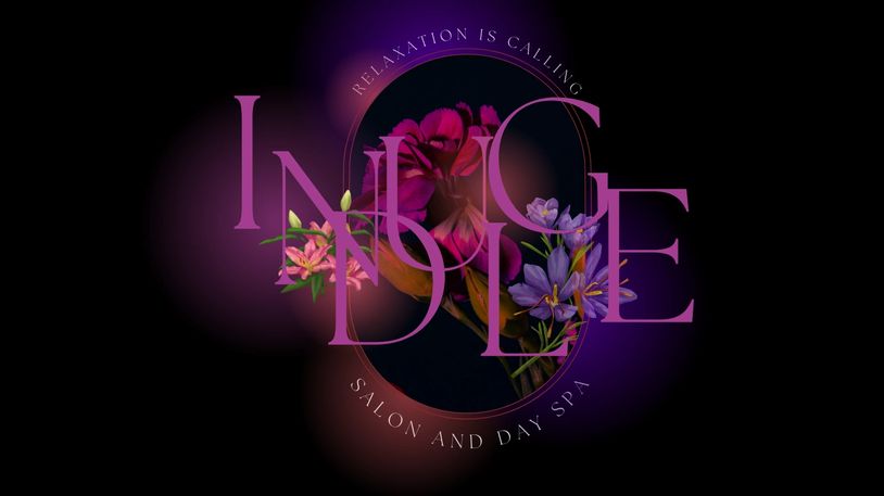 Elegant floral logo for Indigo Salon and Day Spa with purple tones.