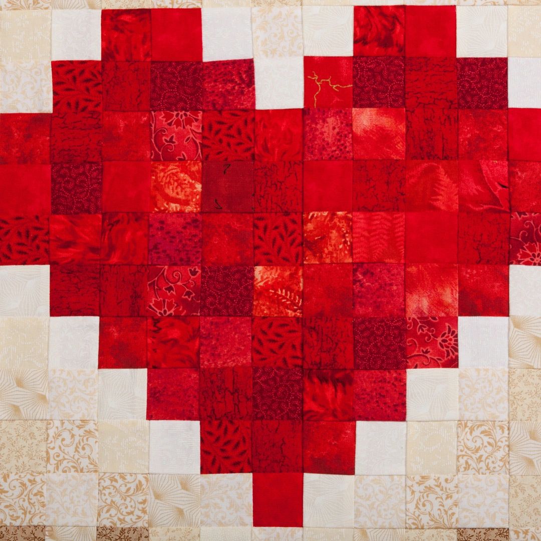 wedding venue in Corsicana Texas memory quilt with red heart.