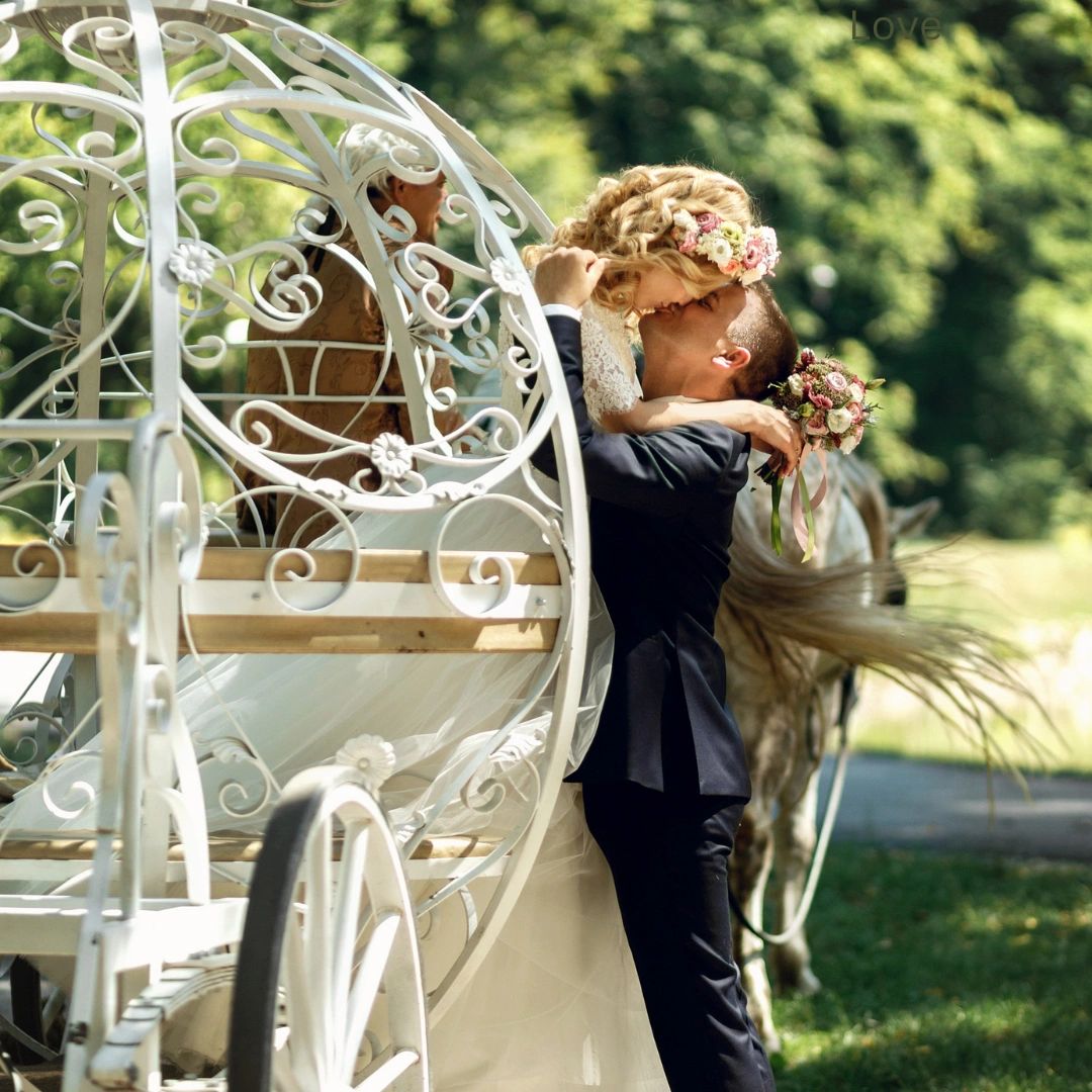 Kerens wedding venue near Dallas with bride and groom kissing in a horse and carriage.