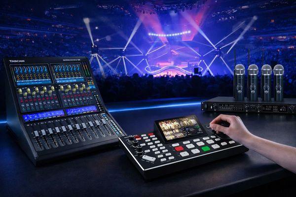 Audio and video control equipment in a live concert setting.