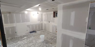 Drywall, mud and tape in basement AirBNB unit