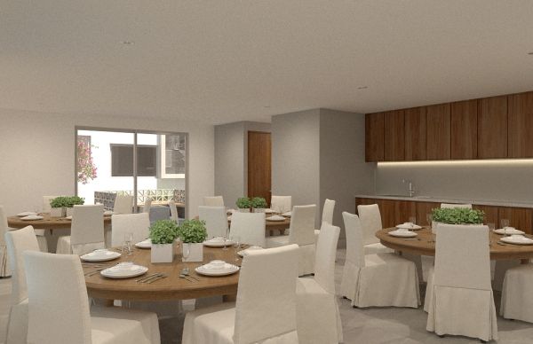 Modern dining room with round wooden tables and white chairs.
