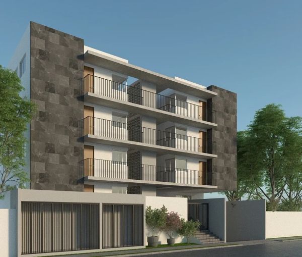 Modern three-story residential building with balconies and dark stone accents.