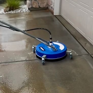 Pressure washing a driveway 