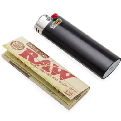 Black Bic lighter and RAW rolling papers.