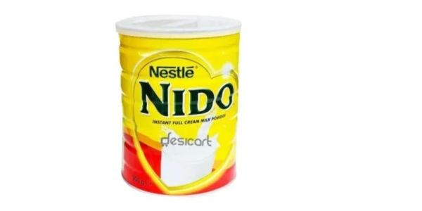 Nestle Nido instant full cream milk powder can with yellow and red design.